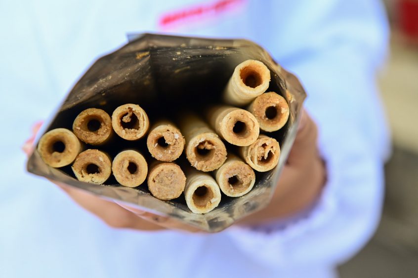 Nutrix are rolled up wafers made of fish paste, along with rice, mung bean, soybean, canola (rapeseed) oil, and vegetable shortening as an additional source of fat. Photo by Neil Palmer.