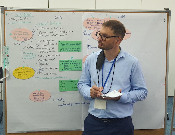 AMD Initiative co-lead, Ben Belton, listening intently to presentations by partner institutions. Photo by Ben Wismen