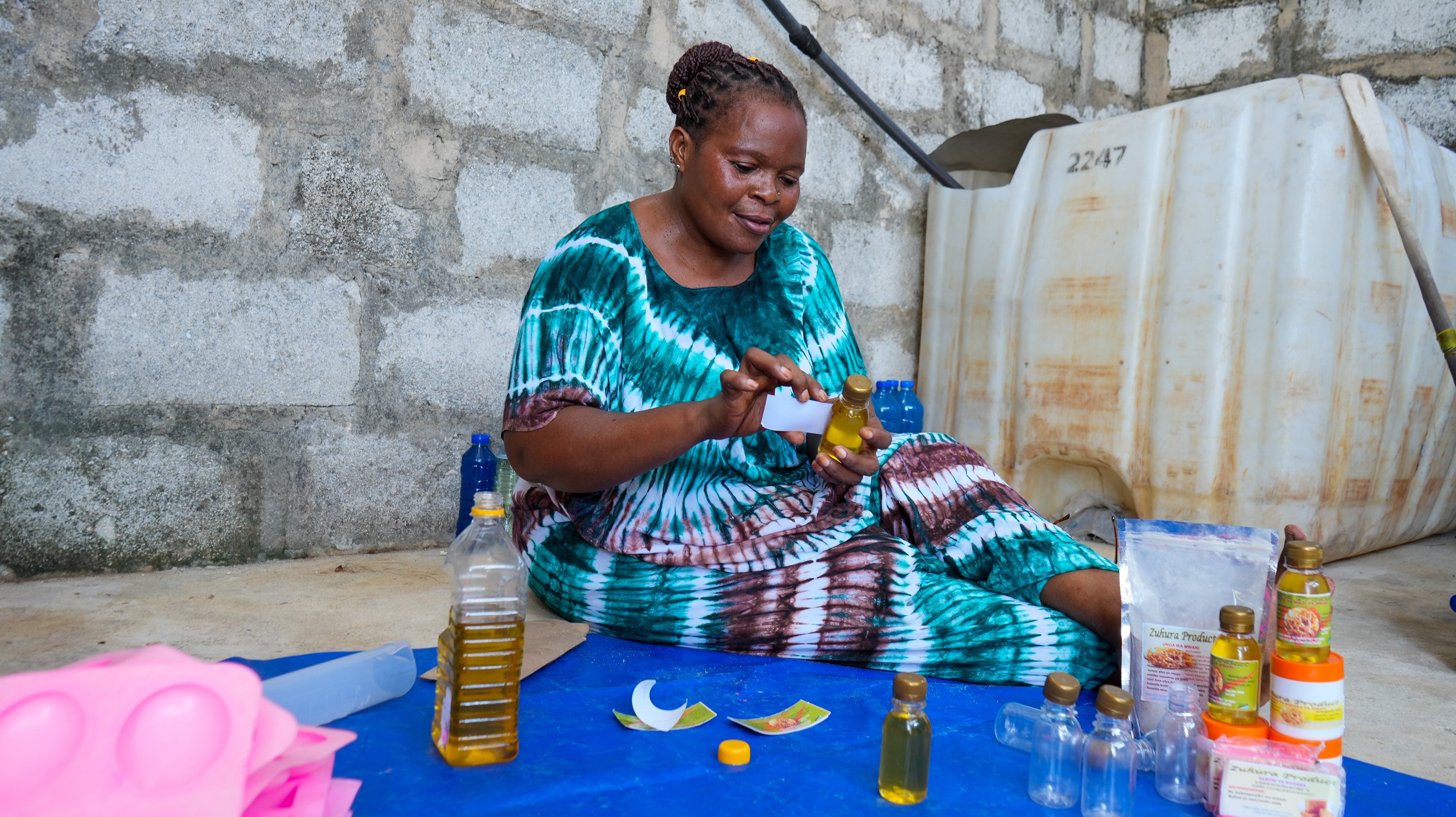 Seaweed grown in Songo Songo is processed locally into body oil, hair food, soap and flour. (Photographed is Zuhura Kibugila, a seaweed farmer).