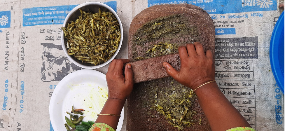 Fish, including its head and eyes, are mashed before putting in the khichuri. Photo by WorldFish/Maherin Ahmed