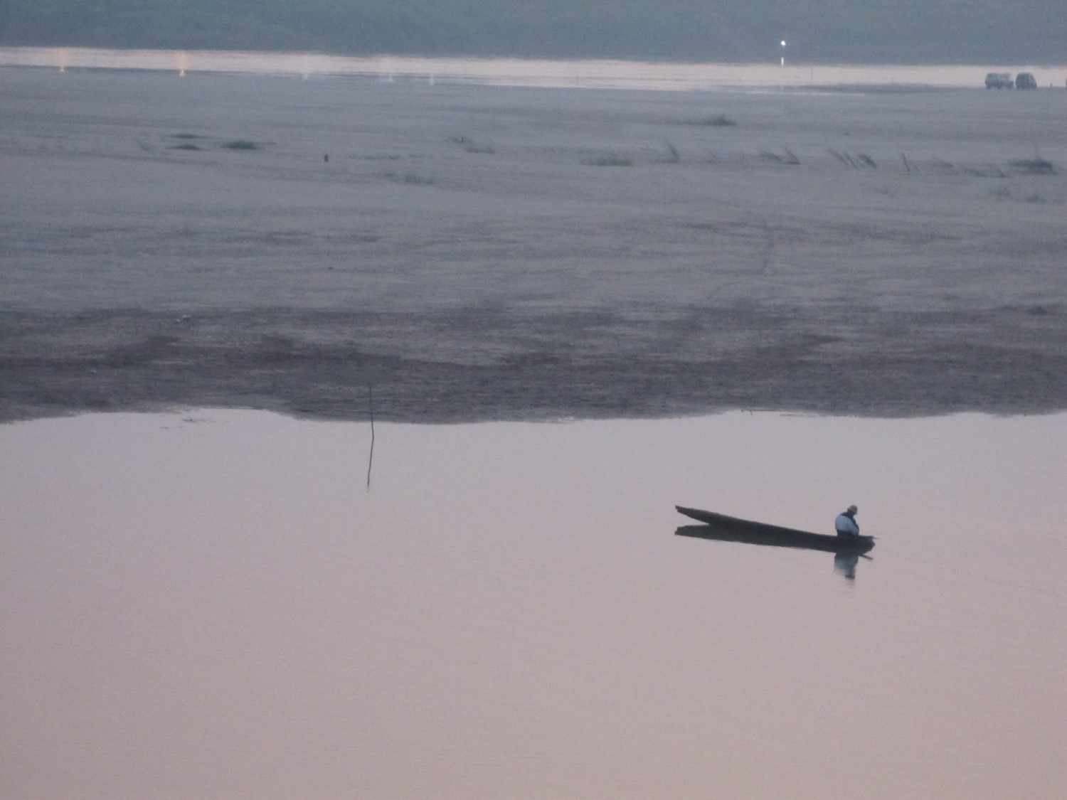 A lone fisherman on the Mekong River in Vientiane, Laos. Photo credit: A. Lynch, USGS.