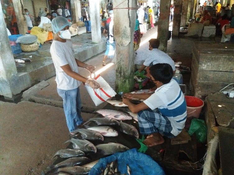 Buyer wearing protective gear