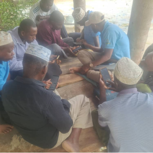 Participants receive hands-on training on the Tracks app, a digital tool that helps small-scale fishers record trips, view fishing routes and use data to support safer, more sustainable fisheries.