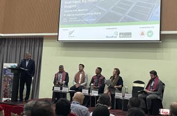 Dr. Jharendu Pant (WorldFish) delivers his presentation “Small Island, Big Impact: The Timor-Leste Aquaculture Blueprint,” during the opening of the 4th National Aquaculture Forum (NAF4) in Dili, Timor-Leste. Seated behind him on the dais are (third from left) H.E. Domingos da Conceição dos Santos, Secretary of State for Fisheries (MALFF), and (fourth from left) H.E. Helen Tunnah, Ambassador of New Zealand to Timor-Leste, alongside other distinguished guests and representatives. Photo: Shwu Jiau Teoh/WorldF