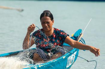 Xandriña da Conceição aboard a boat off the coast of Atauro Island, Timor-Leste. Photo: Ana Pinto da Silva, WorldFish