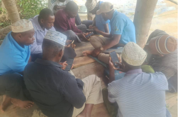 Participants receive hands-on training on the Tracks app, a digital tool that helps small-scale fishers record trips, view fishing routes and use data to support safer, more sustainable fisheries.