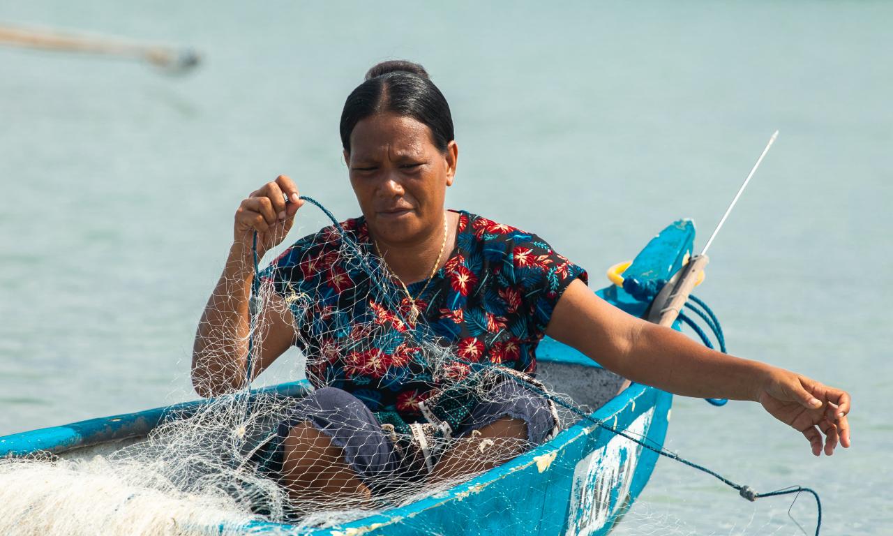 Xandriña da Conceição aboard a boat off the coast of Atauro Island, Timor-Leste. Photo: Ana Pinto da Silva, WorldFish